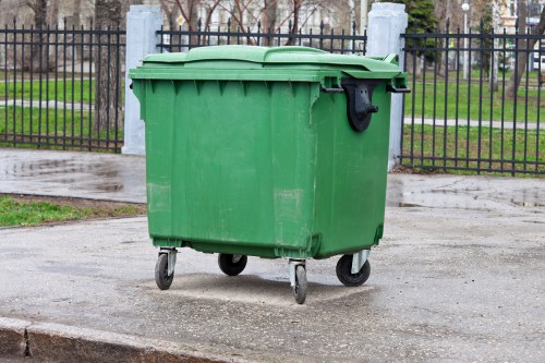 Workers collecting old furniture for disposal in Blackfriars